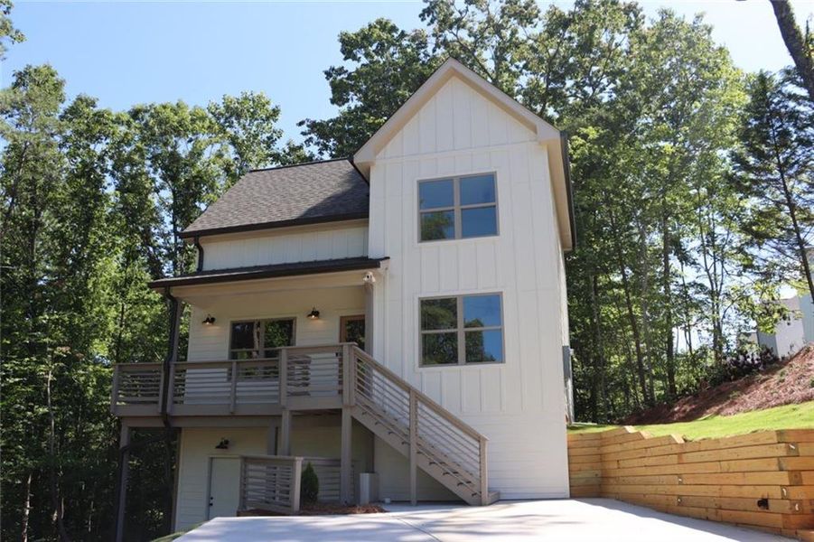 Front exterior of a new home in , Gainesville, GA, highlighting curb appeal (Image 24). Front exterior of a new home in , Gainesville, GA, highlighting curb appeal (Image 24).