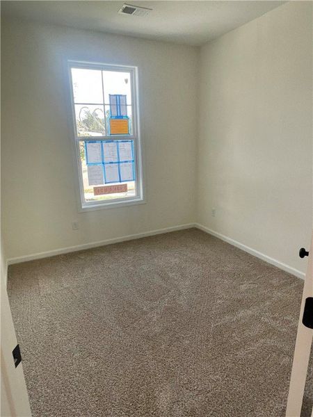 Spacious, unfurnished interior of a new home in Springwood Grove, Central (Image 15).