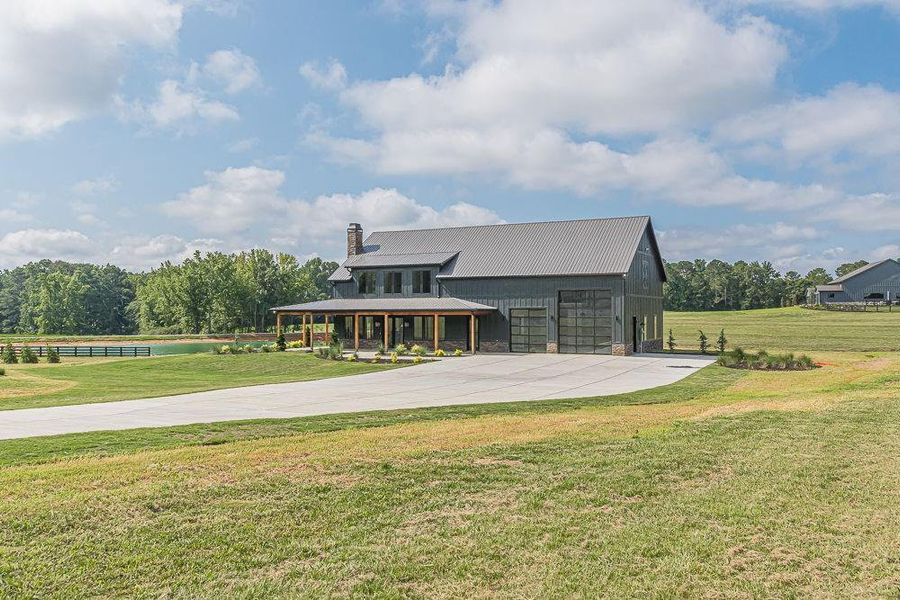 Front exterior of a new home in , Bremen, GA, highlighting curb appeal (Image 25). Front exterior of a new home in , Bremen, GA, highlighting curb appeal (Image 25).