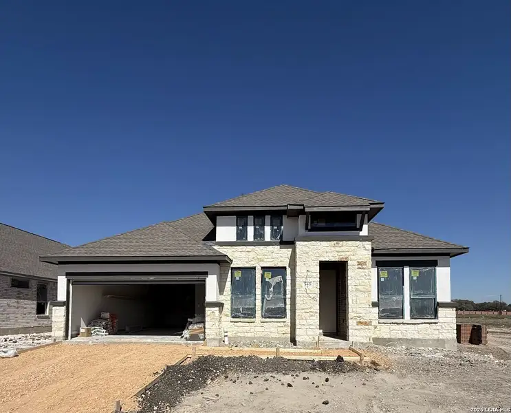 In-progress construction of a new home in Buffalo Crossing, Cibolo, TX (Image 6).