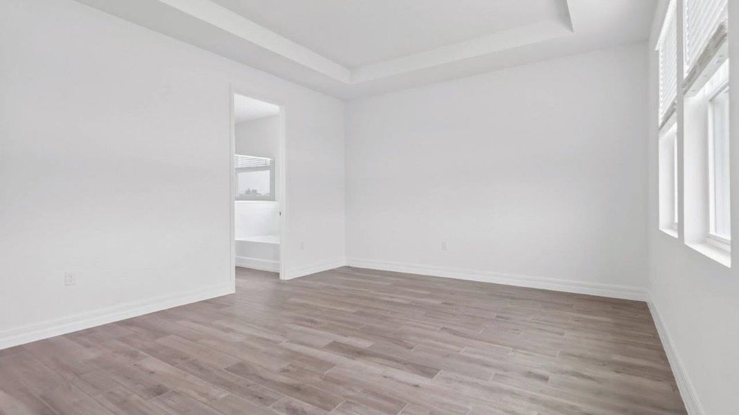 Representative unfurnished interior of a home built from the Camden by D.R. Horton in Lakes of Mount Dora, Mount Dora (Image 35).