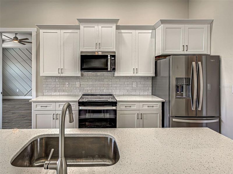 Furnished interior view inside a new home in , Port Charlotte (Image 38).