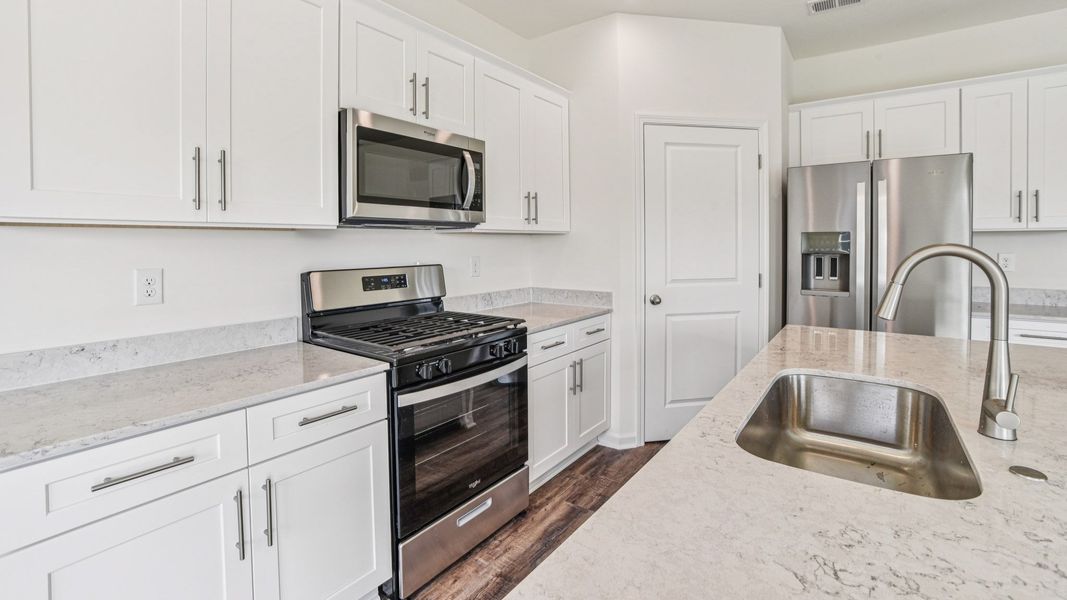 Representative furnished interior of a home built from the Craig by D.R. Horton in The Hideaway at Fox Meadows, Bluff City (Image 6).