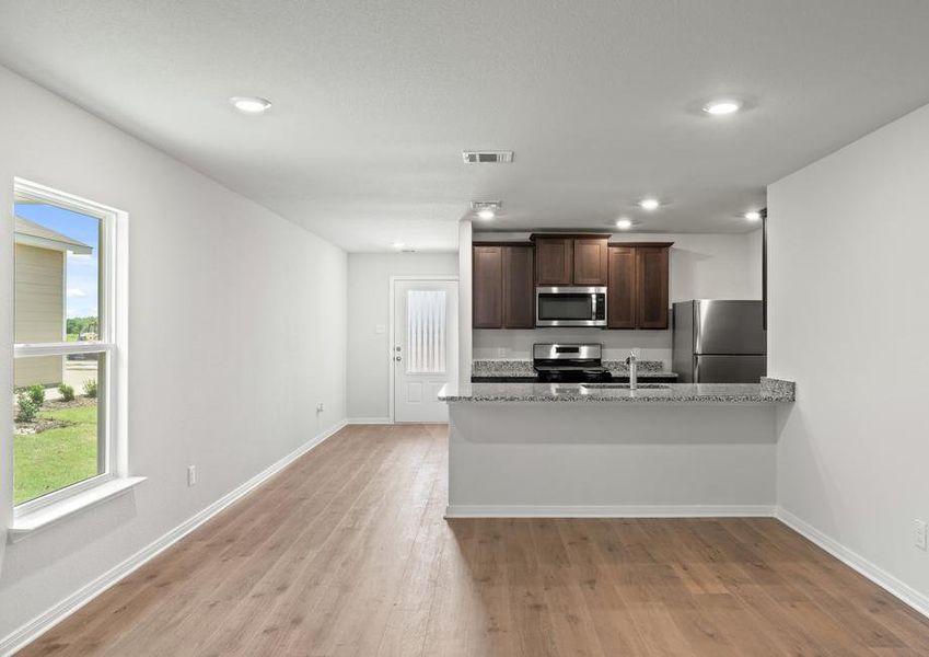 The dining room of the Cedar floor plan sits just off of the kitchen.