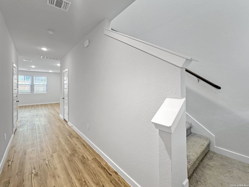 Spacious, unfurnished interior of a new home in Bear Creek, San Antonio (Image 19).