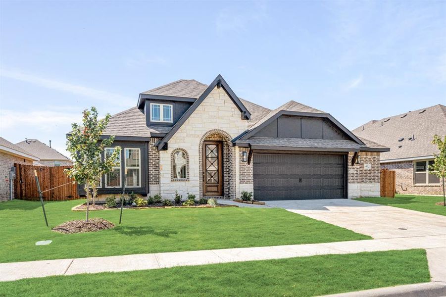 Front exterior of a new home in Maplewood, Glenn Heights, TX, highlighting curb appeal (Image 23).