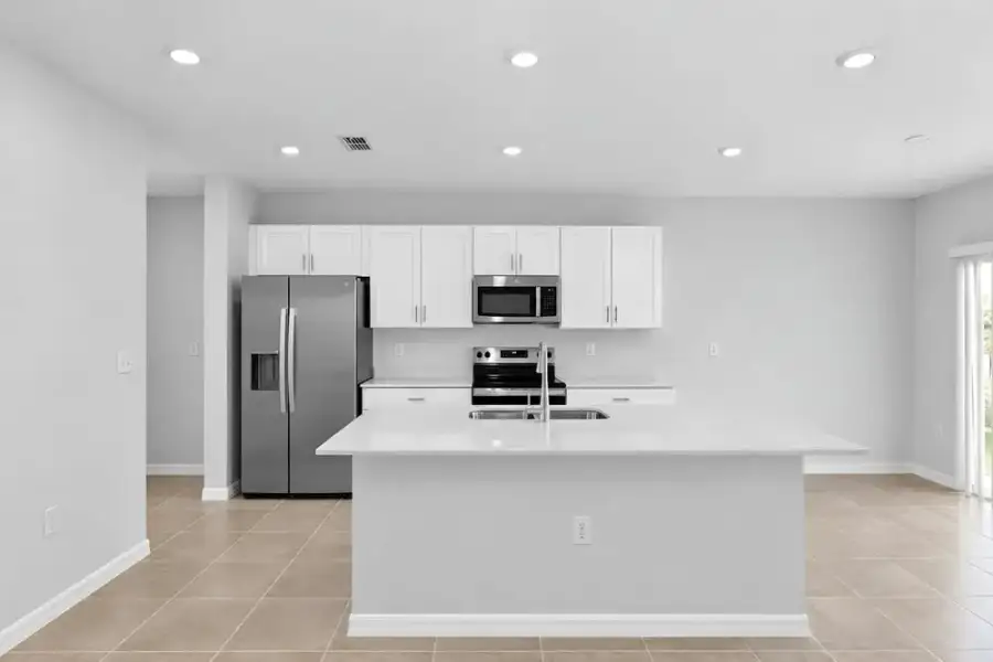 Representative furnished interior of a home built from the Dove by Taylor Morrison in Azure at Solaeris, Port St. Lucie (Image 8).