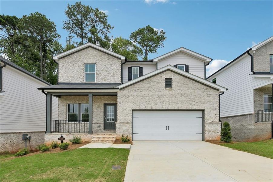 Front exterior of a new home in Martin Springs - Estate Series, Lawrenceville, GA, highlighting curb appeal (Image 23).