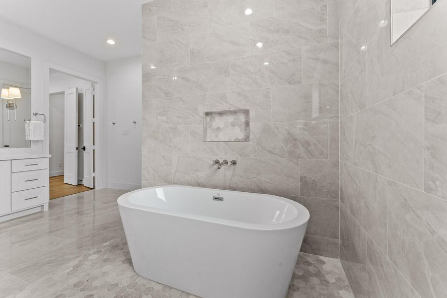 Soaking tub and two large primary closets!