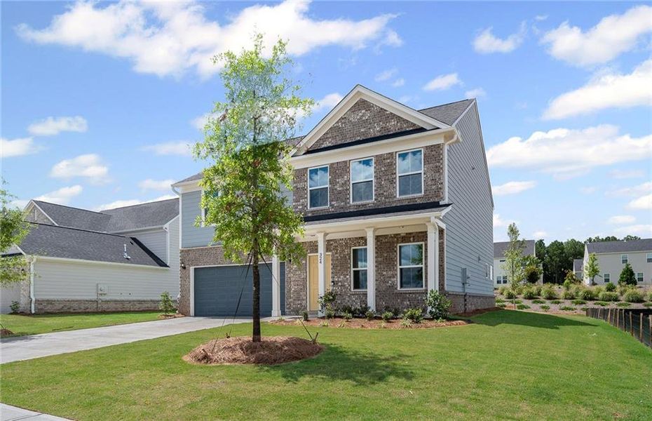 Front exterior of a new home in Hawthorne Ridge, McDonough, GA, highlighting curb appeal (Image 19).