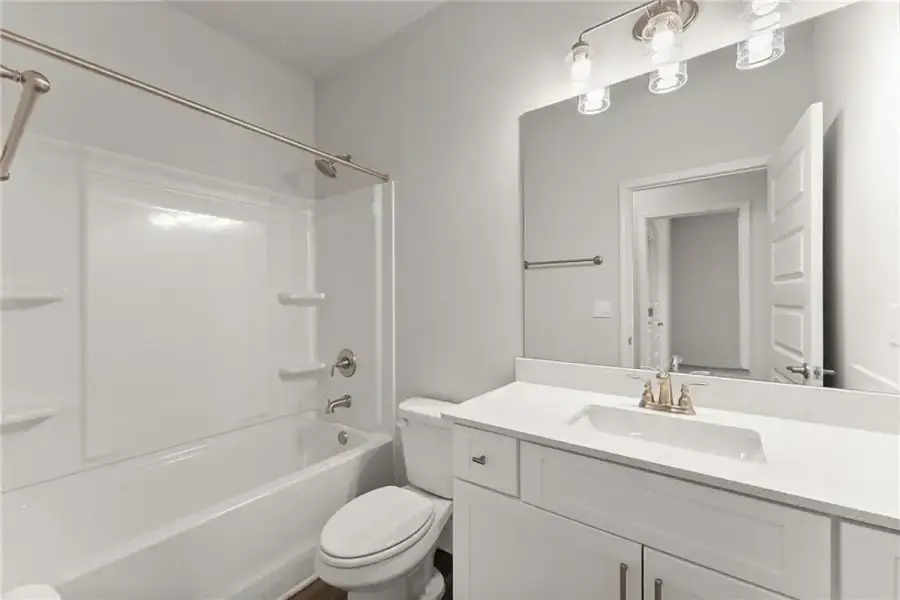 Representative furnished interior of a home built from the 1709 by Adams Homes in Ham Farm, La Grange (Image 7).