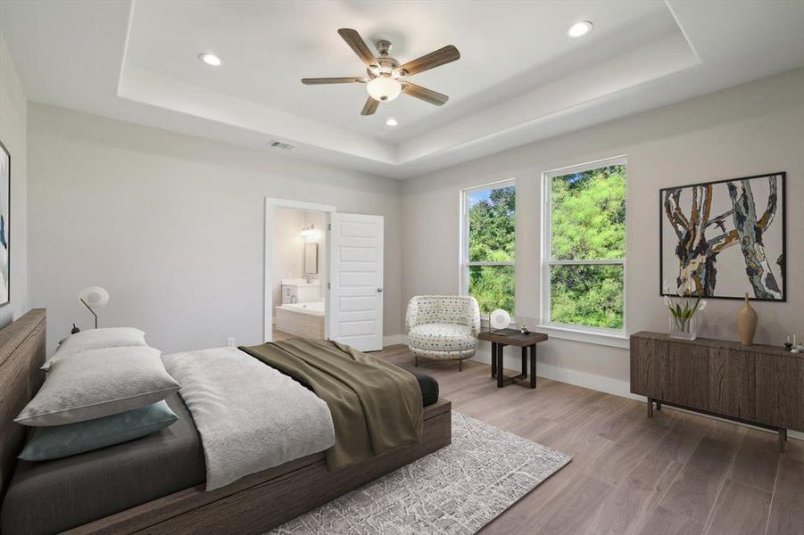 Lots of natural light with a trayed ceiling & fan [photo is virtually staged]