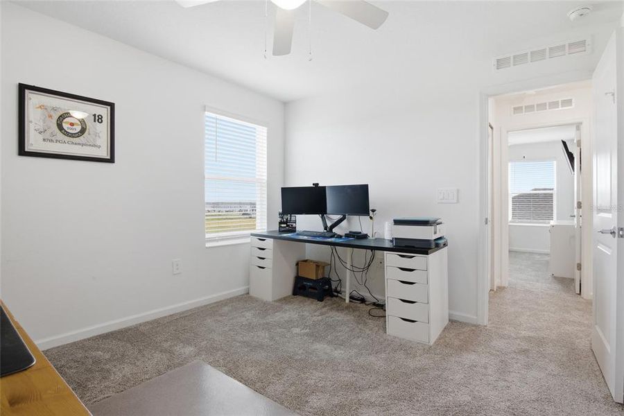 Furnished interior view inside a new home in Wellness Ridge, Clermont (Image 40).