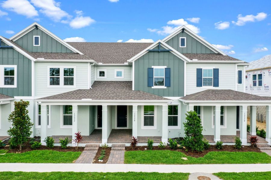 Representative exterior photo of a completed home built from the Edison by Rockwell Homes in Harvest at Ovation - Townhomes, Winter Garden, FL (Image 29). Representative exterior photo of a completed home built from the Edison by Rockwell Homes in Harvest at Ovation - Townhomes, Winter Garden, FL (Image 29).