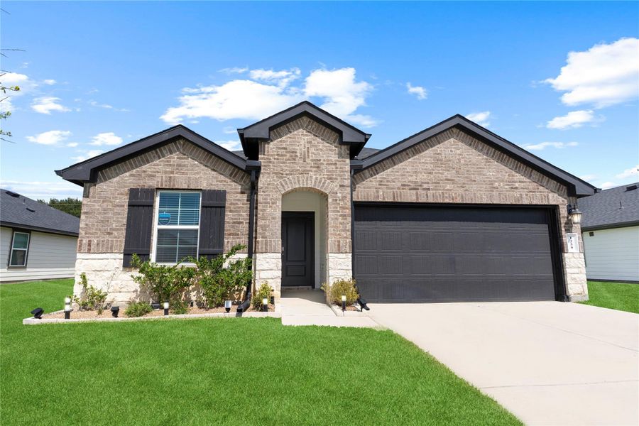 Looking at the beautiful exterior highlights the timeless brick elevation with graceful stone accents, and elegant arched entry that make this home truly stand out. The long driveway offers plenty of parking space, while the well-kept yard adds to the picture-perfect first impression. Large private backyard, no one behind you! Looking at the beautiful exterior highlights the timeless brick elevation with graceful stone accents, and elegant arched entry that make this home truly stand out. The long driveway offers plenty of parking space, while the well-kept yard adds to the picture-perfect first impression. Large private backyard, no one behind you!