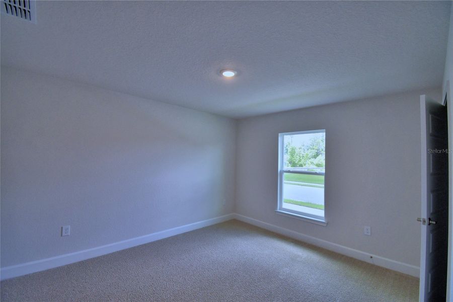 Spacious, unfurnished interior of a new home in Cadence Crossing, Auburndale (Image 22).