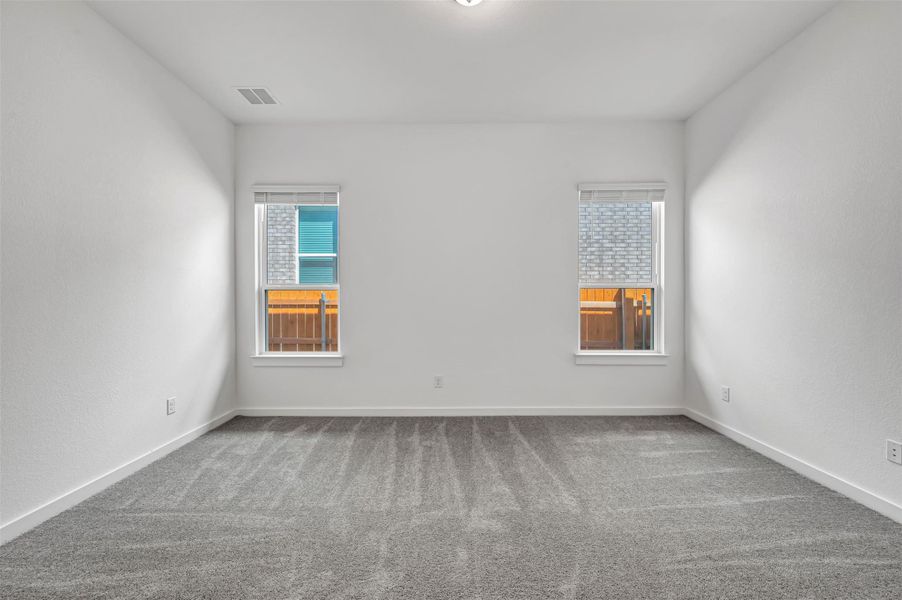 Spacious, unfurnished interior of a new home in Heritage, Dripping Springs (Image 35).