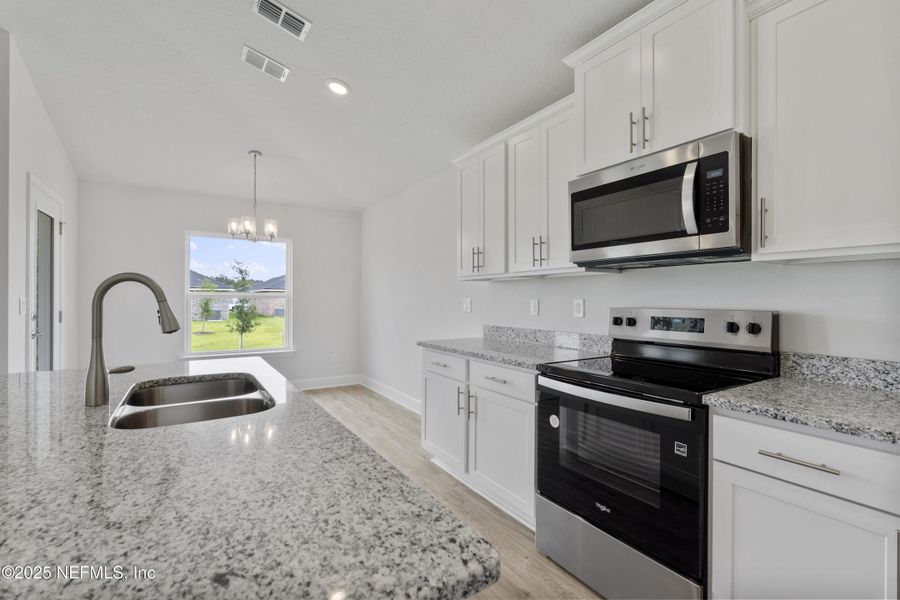 Furnished interior view inside a new home in Shadow Crest at Rolling Hills, Green Cove Springs (Image 9).
