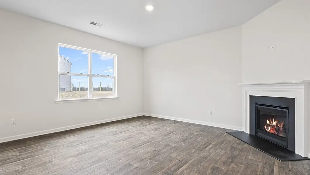 Representative unfurnished interior of a home built from the Macon by D.R. Horton in Lakestone, Woodruff (Image 12).