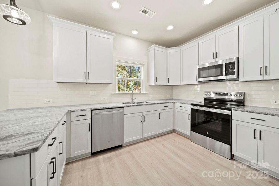 Furnished interior view inside a new home in , Monroe (Image 10).