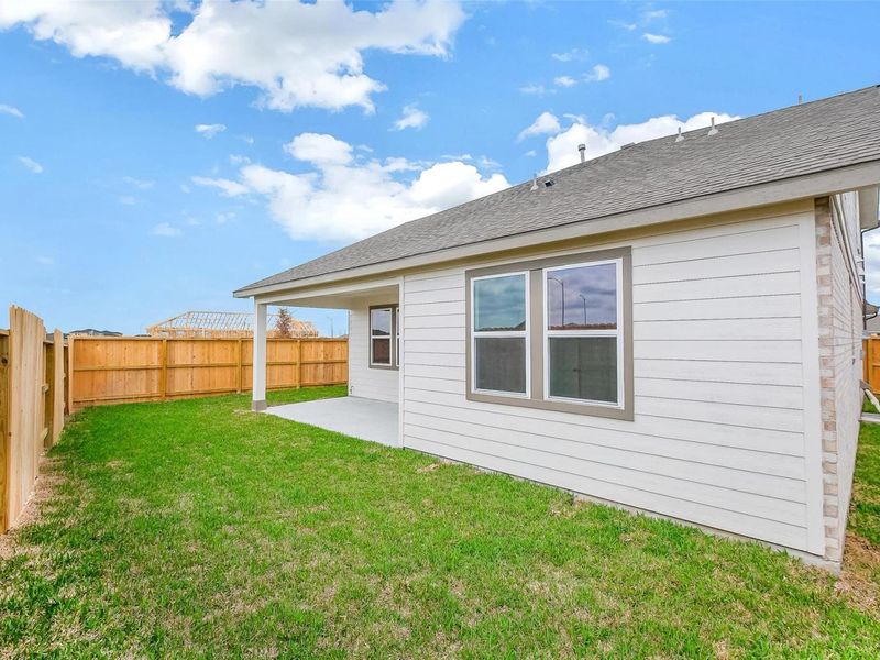 Exterior details and patio area of a home in Emberly, Beasley (Image 23).