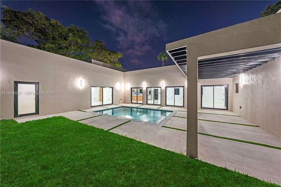 Exterior details and patio area of a home in , North Miami (Image 32).