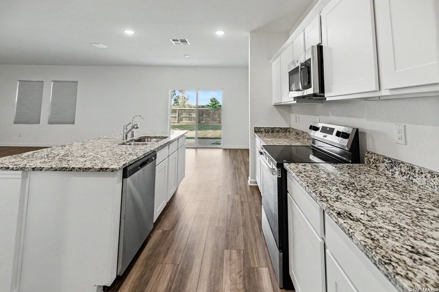 Furnished interior view inside a new home in Hennersby Hollow, San Antonio (Image 11).