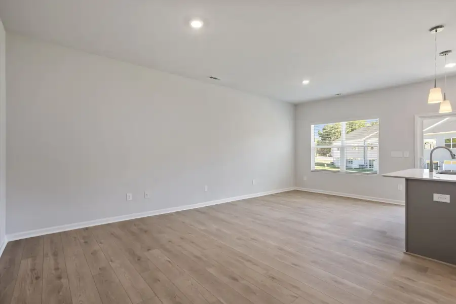 Spacious, unfurnished interior of a new home in West Main Townhomes, Sanford (Image 19).