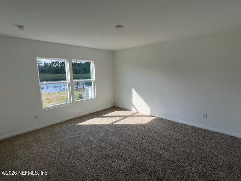 Spacious, unfurnished interior of a new home in Sawmill Branch, Palm Coast (Image 21).