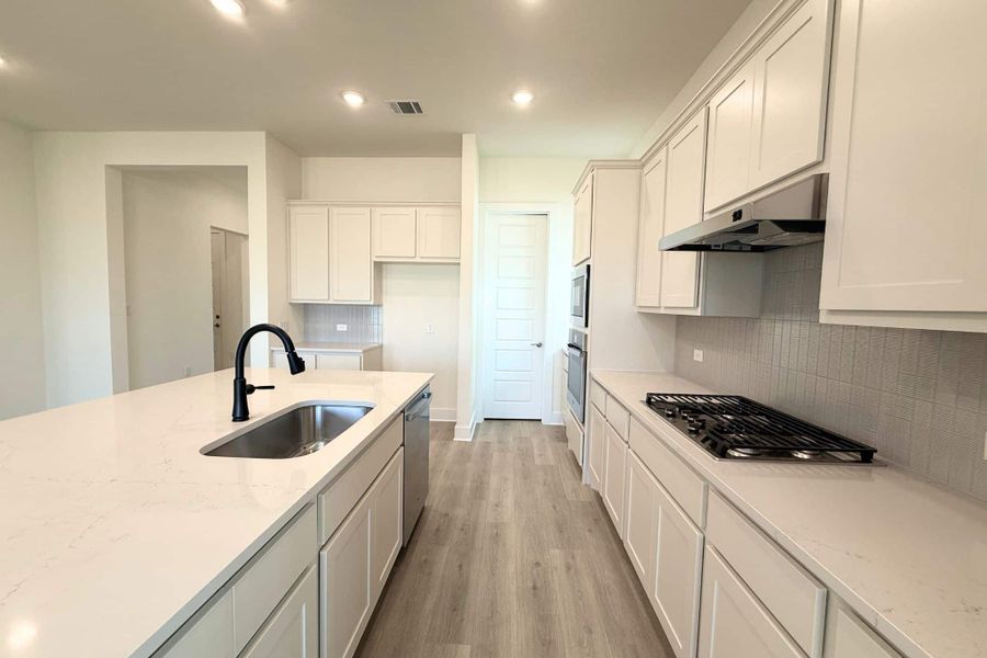 Furnished interior view inside a new home in The Grove at Blackhawk, Pflugerville (Image 8).