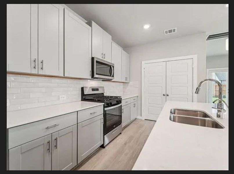 Photo is not of the actual home, but is an inspirational photo of builder’s model home and may depict options, furnishings, and/or decorator features that are not included
