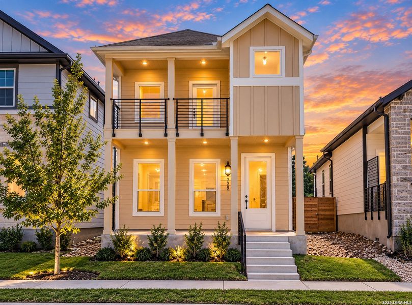 Front exterior of a new home in Town Creek, New Braunfels, TX, highlighting curb appeal (Image 2). Front exterior of a new home in Town Creek, New Braunfels, TX, highlighting curb appeal (Image 2).