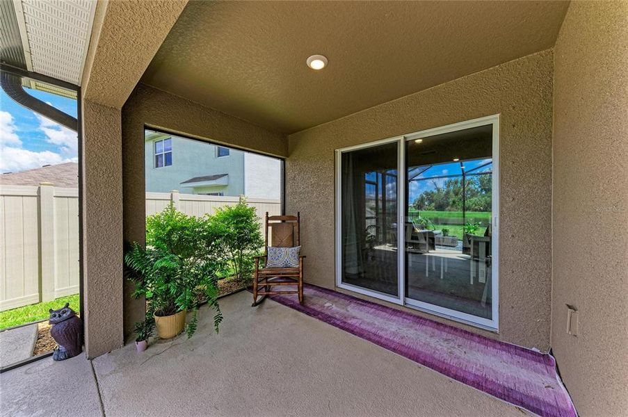 Exterior details and patio area of a home in Bella Lago, Parrish (Image 23).