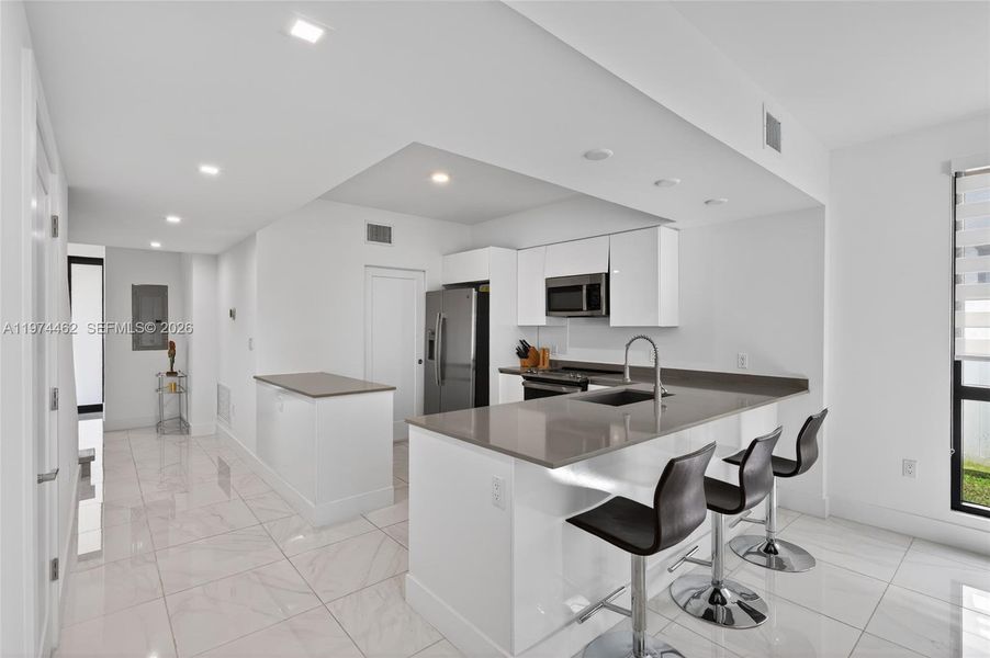 Furnished interior view inside a new home in , Dania Beach (Image 14).