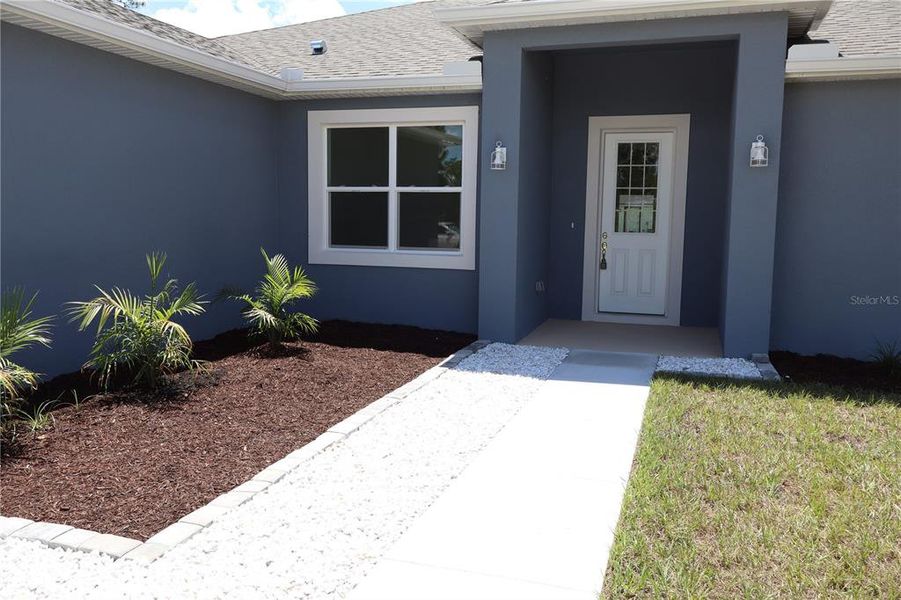 Exterior details and patio area of a home in , Sebring (Image 2). Exterior details and patio area of a home in , Sebring (Image 2).