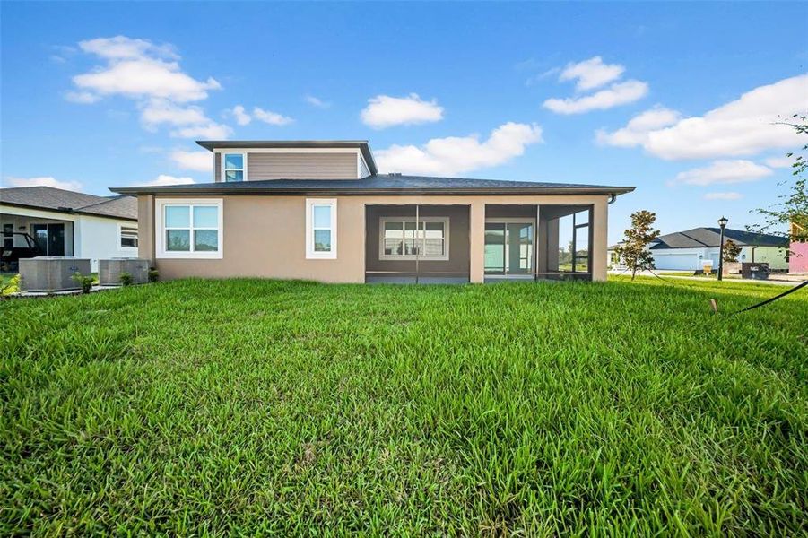 Front exterior of a new home in , Wesley Chapel, FL, highlighting curb appeal (Image 19). Front exterior of a new home in , Wesley Chapel, FL, highlighting curb appeal (Image 19).