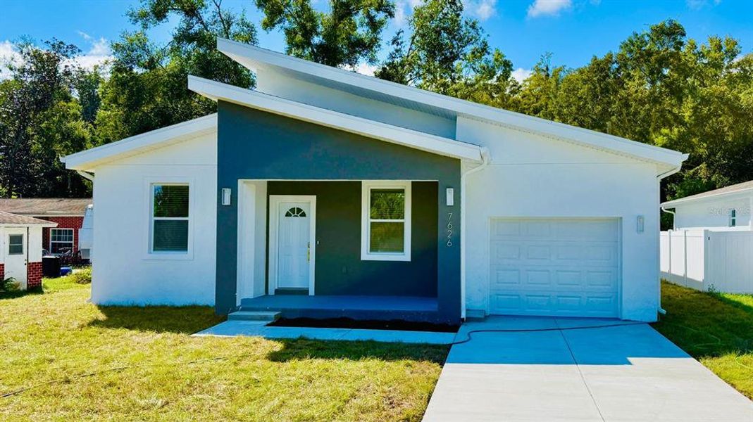 Front exterior of a new home in , New Port Richey, FL, highlighting curb appeal (Image 2).