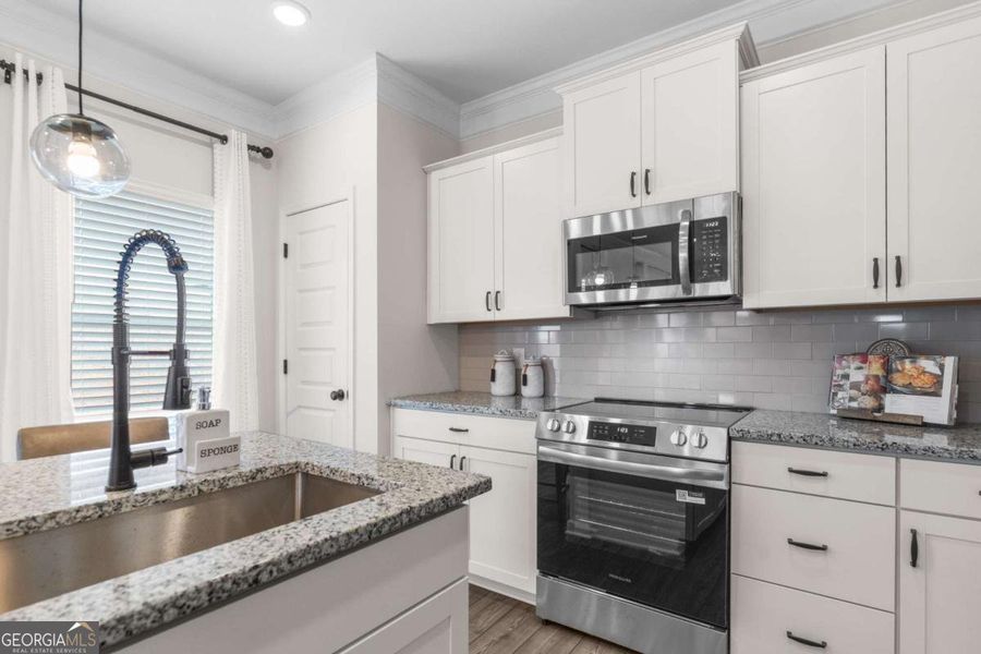 Furnished interior view inside a new home in Trellis Park, Hampton (Image 22).