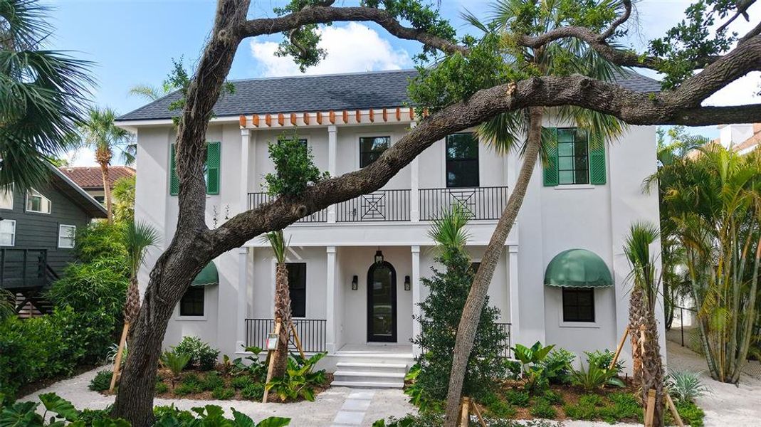 Front exterior of a new home in , Sarasota, FL, highlighting curb appeal (Image 1). Front exterior of a new home in , Sarasota, FL, highlighting curb appeal (Image 1).
