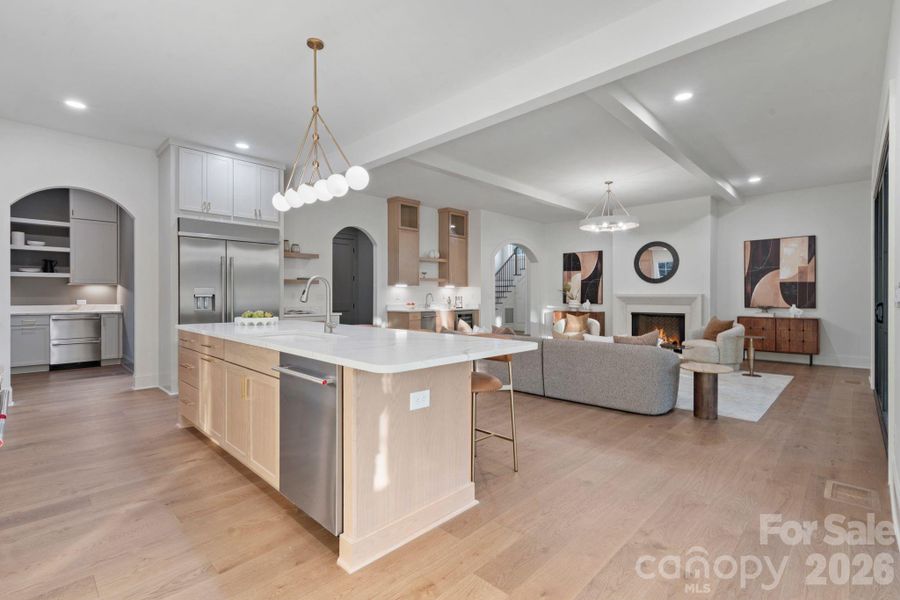 Scullery to the left of the refrigerator