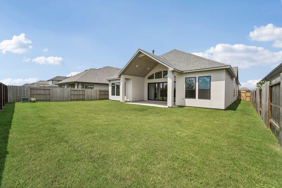 Exterior details and patio area of a home in Del Bello Lakes 60', Manvel (Image 29).