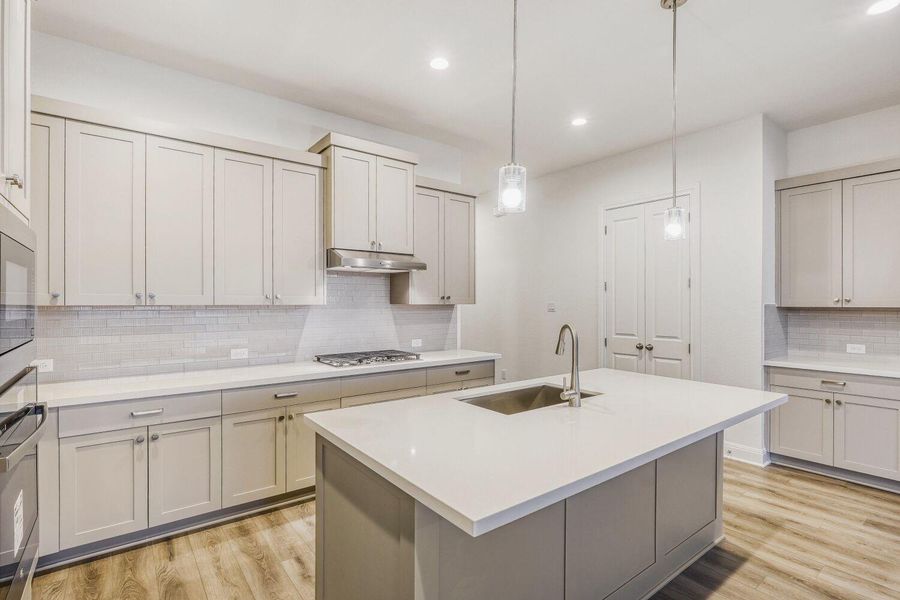 Furnished interior view inside a new home in 6 Creeks, Kyle (Image 5).
