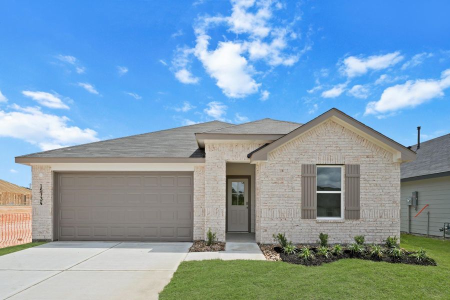 Front exterior of a new home in Chapel Lakes, Montgomery, TX, highlighting curb appeal (Image 2). Front exterior of a new home in Chapel Lakes, Montgomery, TX, highlighting curb appeal (Image 2).