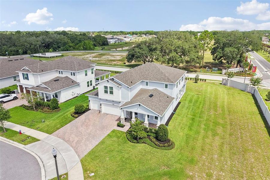 Front exterior of a new home in Acuera Estates, Apopka, FL, highlighting curb appeal (Image 27).