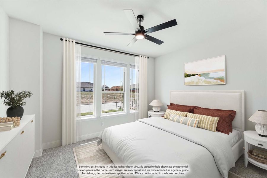 Bedroom with queen bed, ceiling fan, large windows, and white dresser on carpet flooring