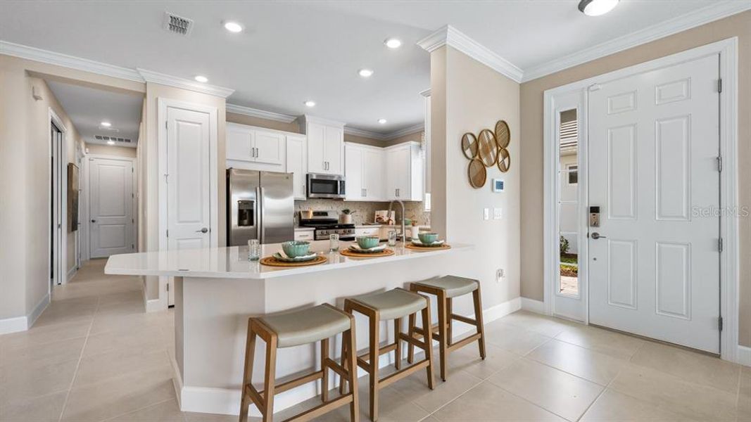 Furnished interior view inside a new home in Esplanade at Wiregrass Ranch, Wesley Chapel (Image 21).