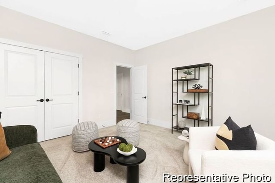 Representative furnished interior of a home built from the Bedford P by True Homes in Homecoming, Ravenel (Image 12).