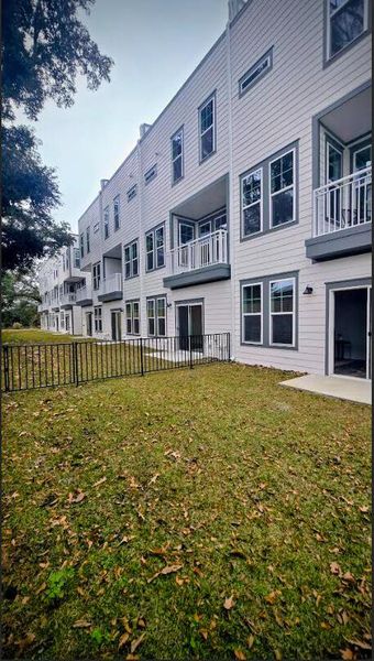 Exterior details and patio area of a home in Walk at Park Circle, North Charleston (Image 28).