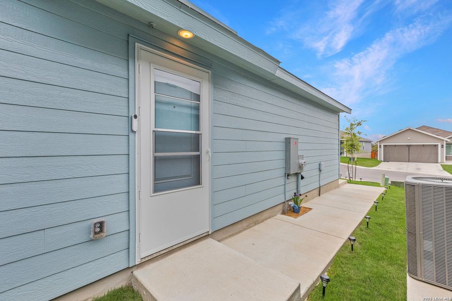 Exterior details and patio area of a home in Brookmill, San Antonio (Image 22).