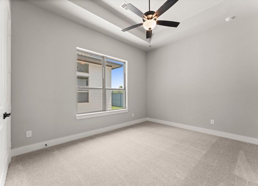 Bedroom 3 with Tray Ceiling and Fan Bedroom 3 with Tray Ceiling and Fan